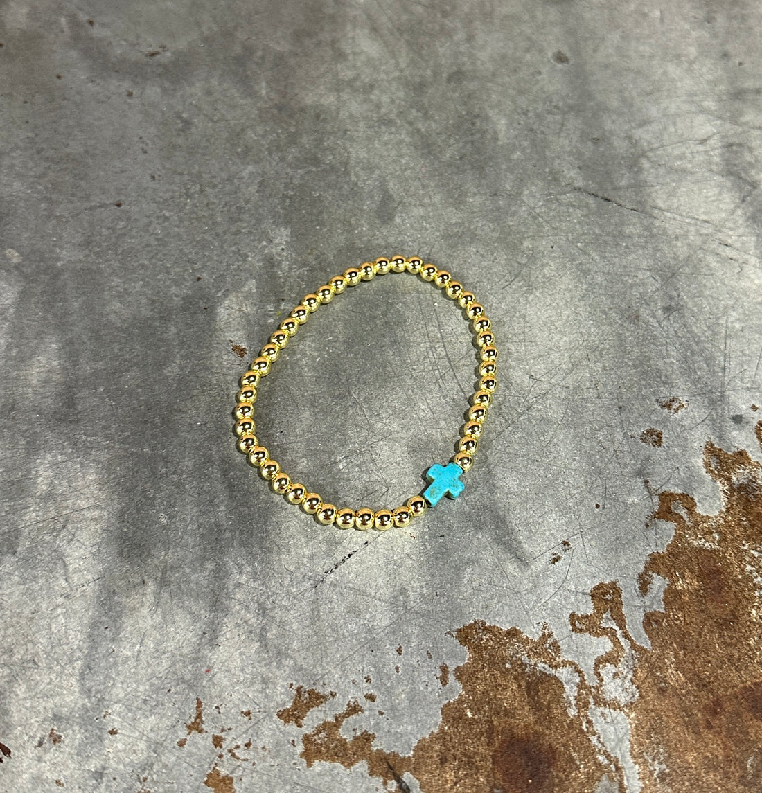 Gold cross beaded bracelet