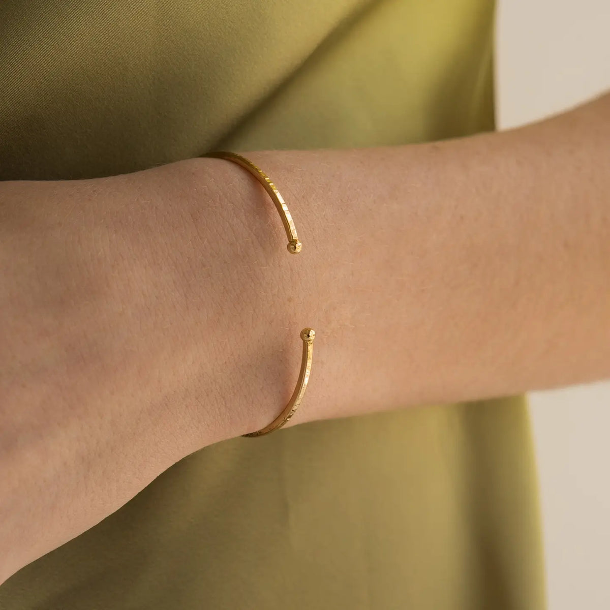 Brenda Grands- 24K Gold Adjustable Thin Hammered Bangle
